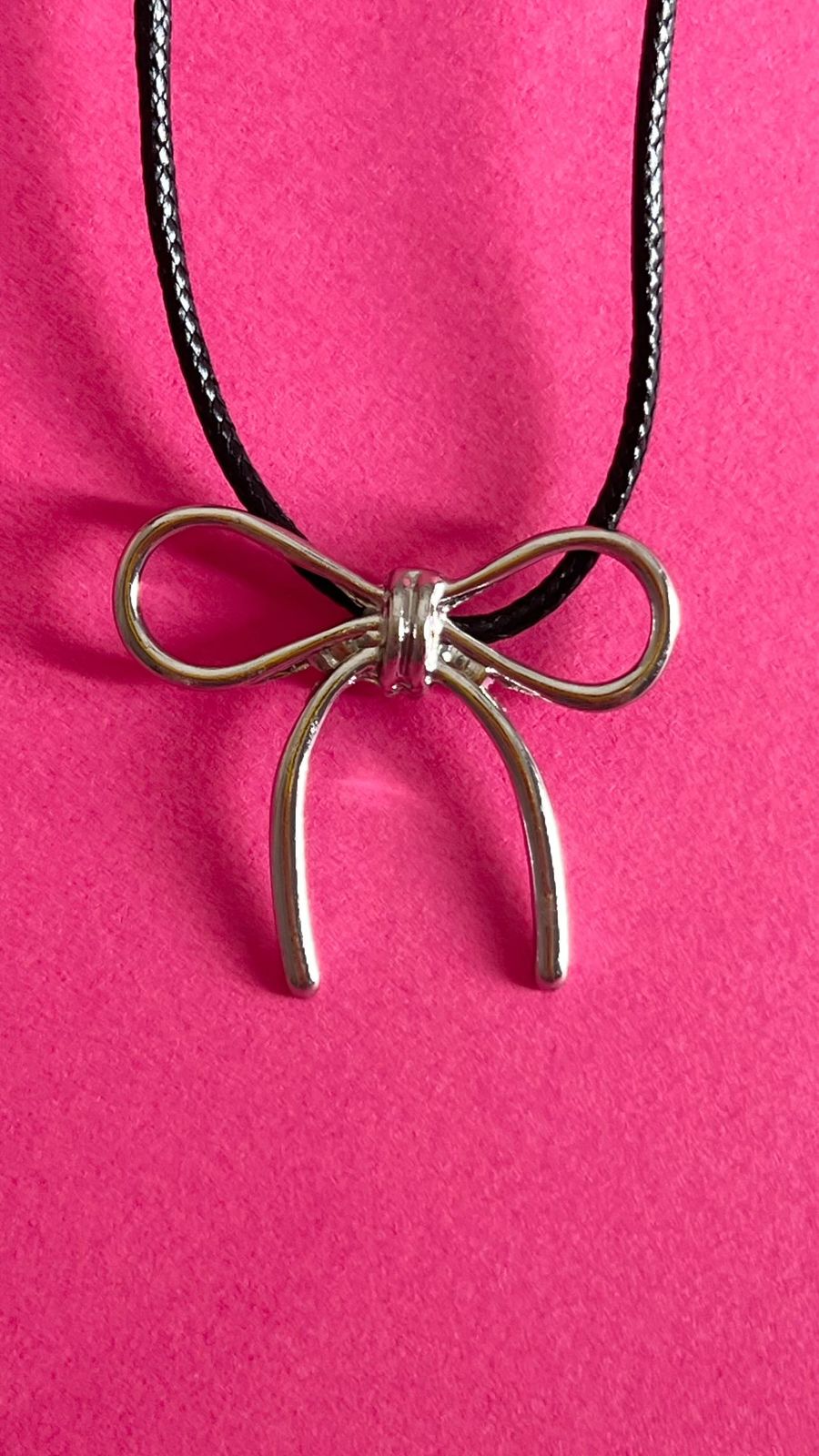 silver bow pendant