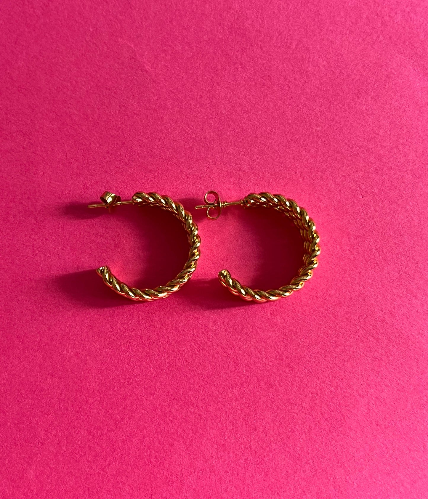 gold twisted statement hoops