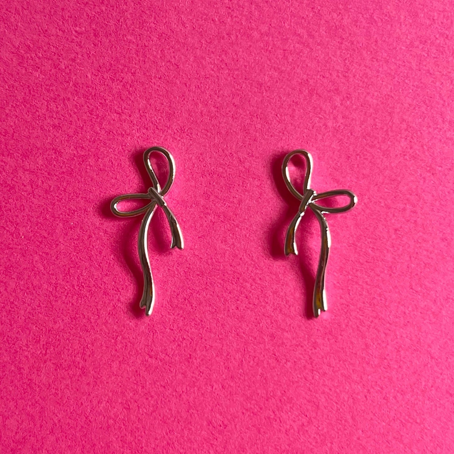 silver bow earrings