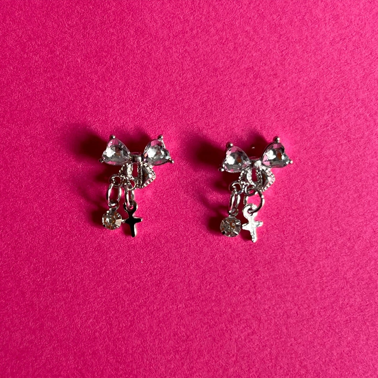 silver bow earrings