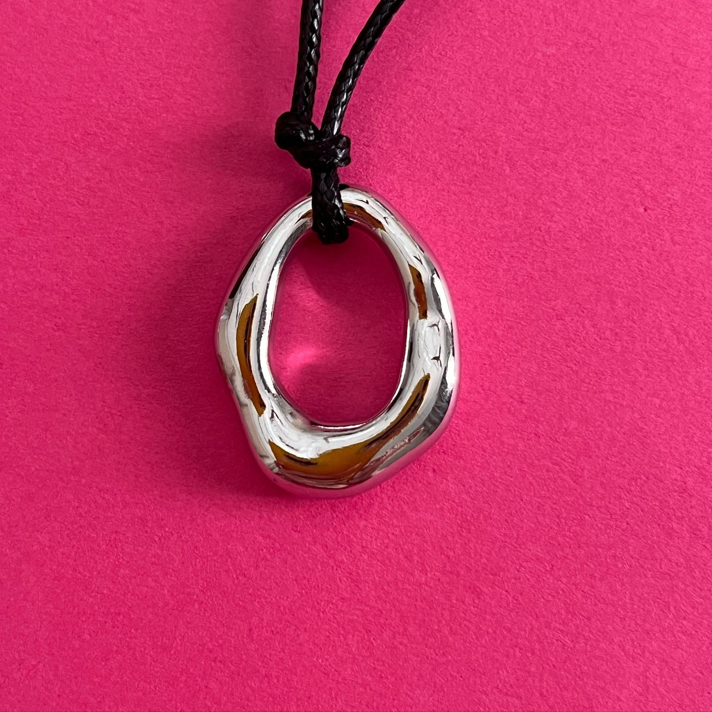 oval silver statement pendant