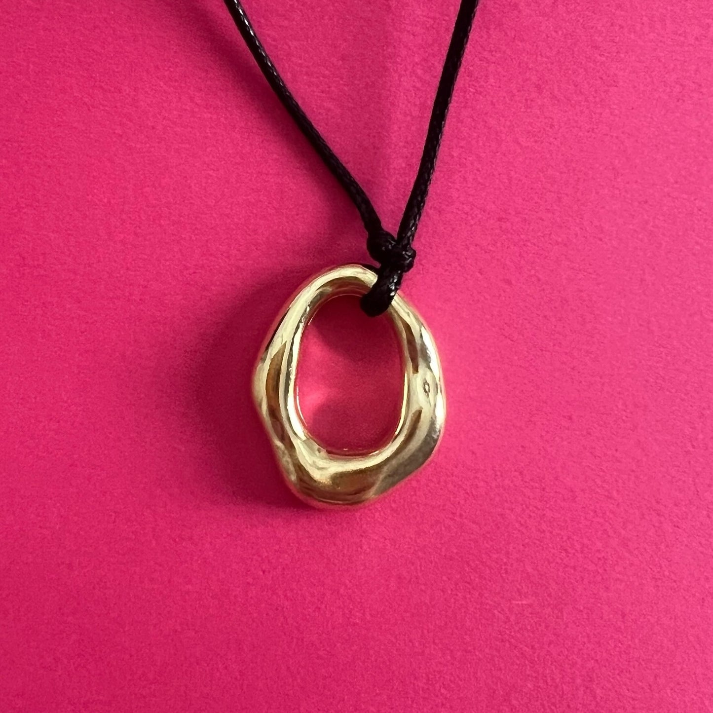 oval gold statement pendant