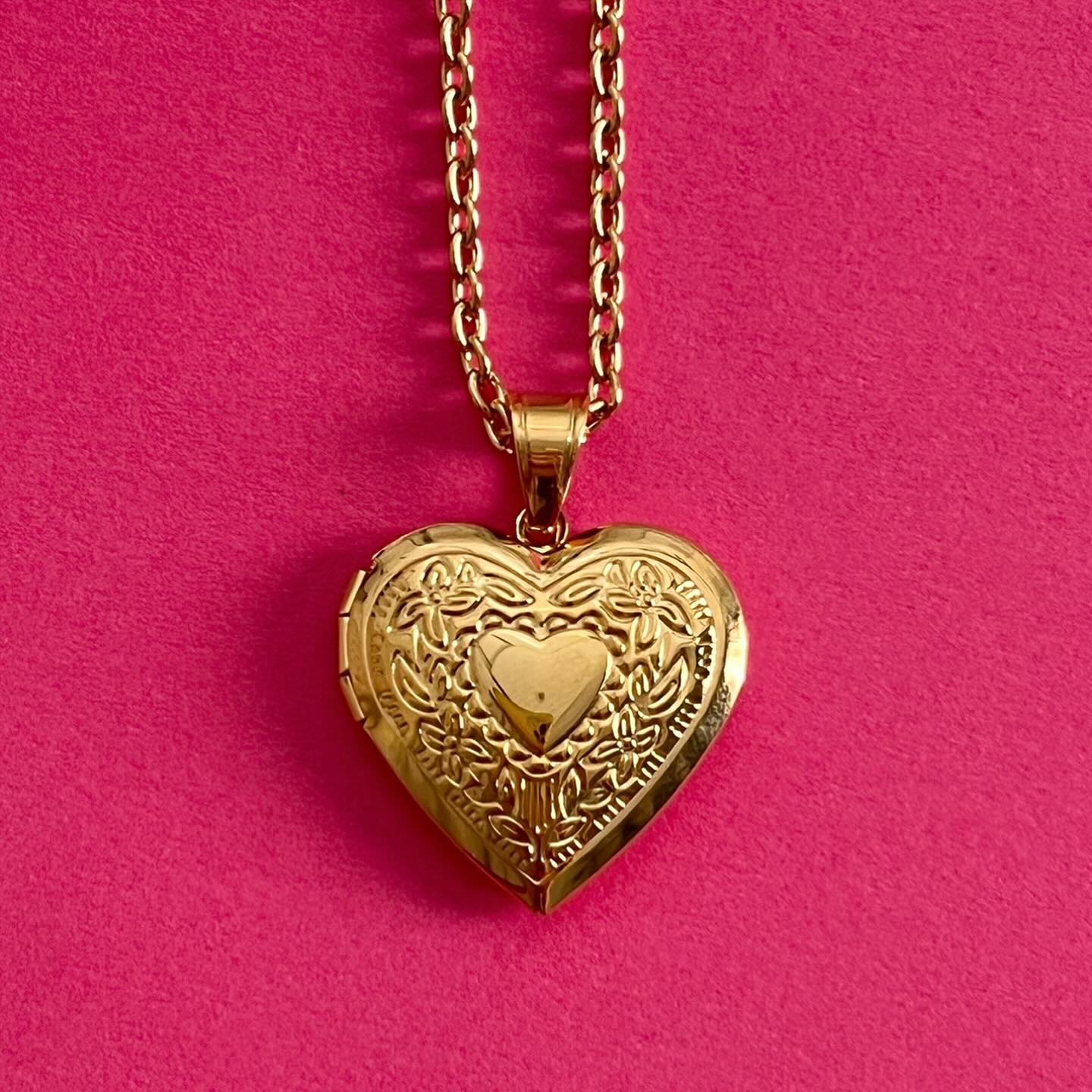 open heart gold pendant