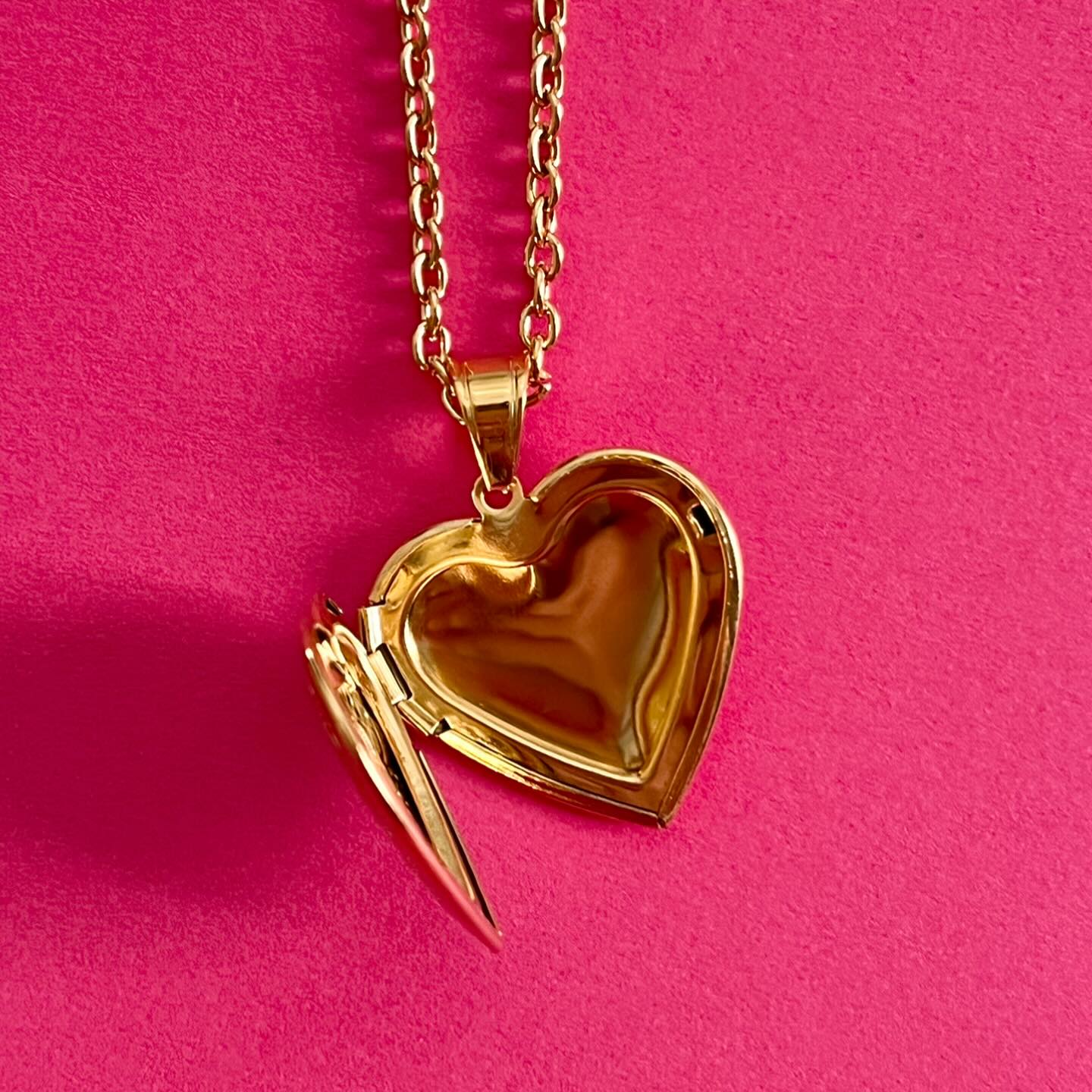 open heart gold pendant