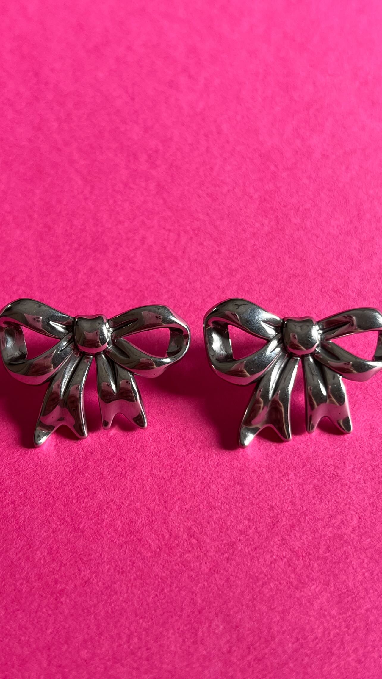 silver bow earrings